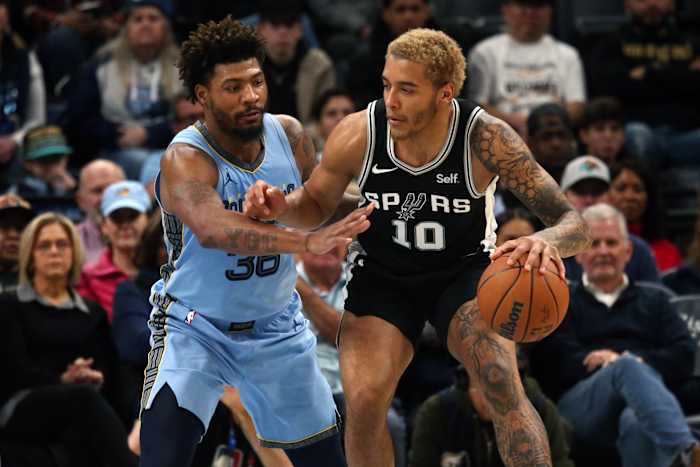 San Antonio Spurs forward Jermey Sochan (10) and Memphis Grizzlies Marcus Smart (36).